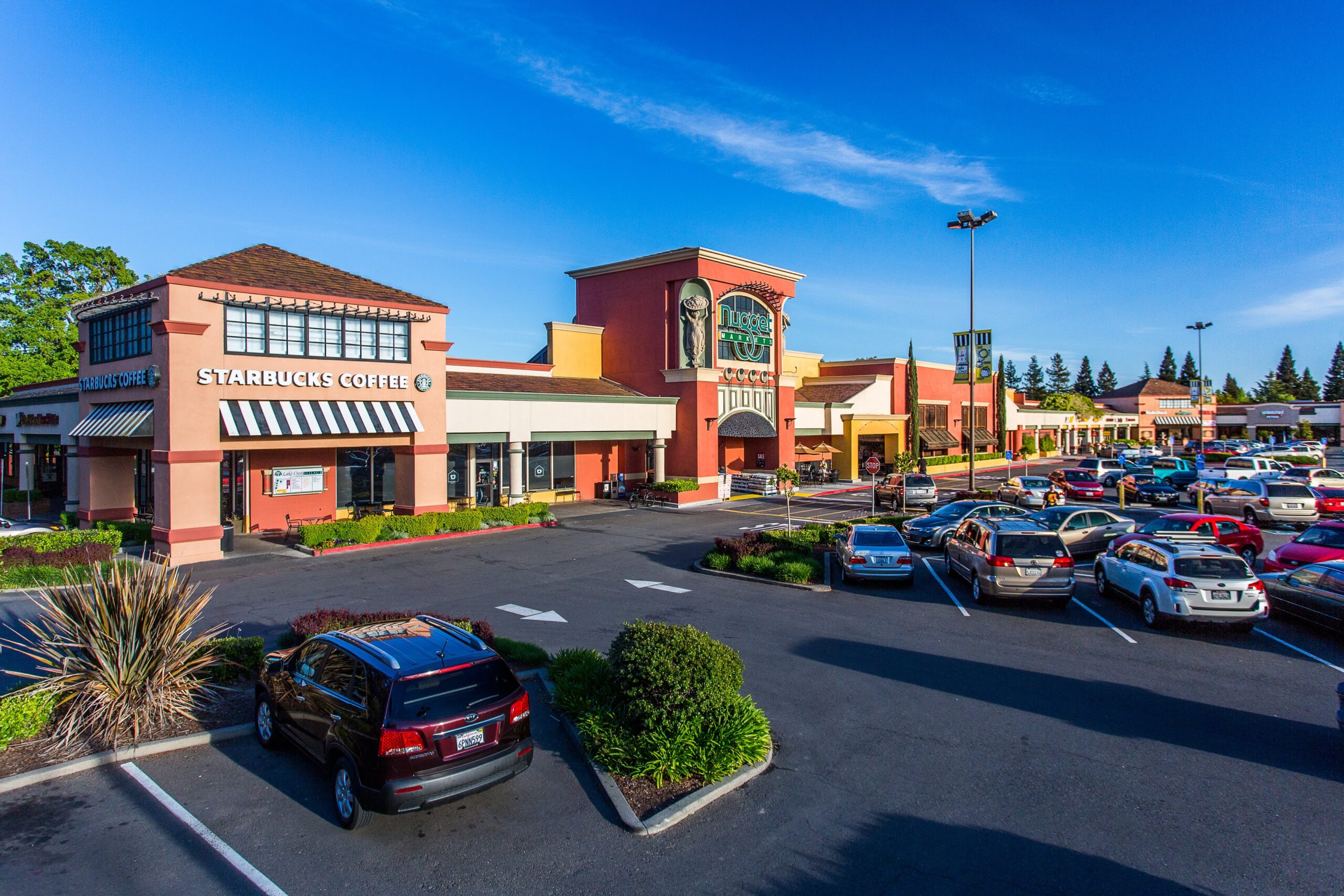 Photo of the Nugget parking lot located in Lake Crest Village shopping center.